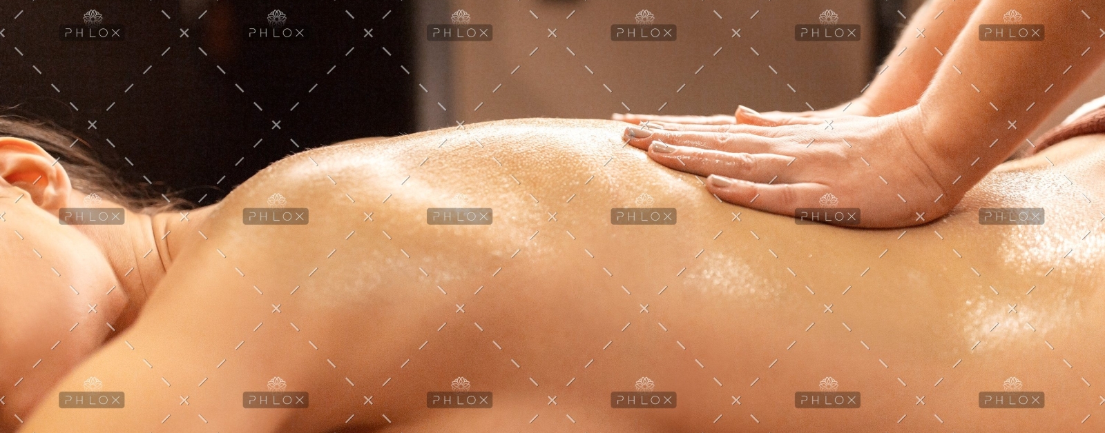 demo-attachment-391-woman-lying-and-having-back-massage-at-spa-P9T7TEZ